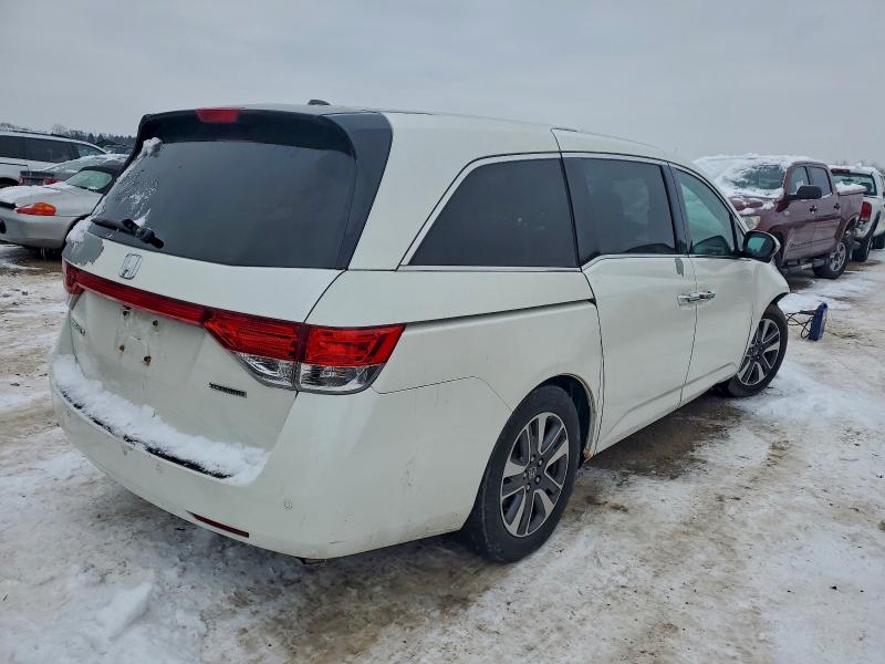 Photo 3 from auction – 2014 HONDA ODYSSEY TO with VIN 5FNRL5H96EB092819