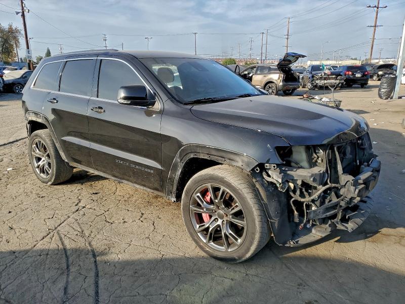 Photo 4 from auction – 2014 JEEP GRAND CHEROKEE with VIN 1C4RJFDJ8EC169635