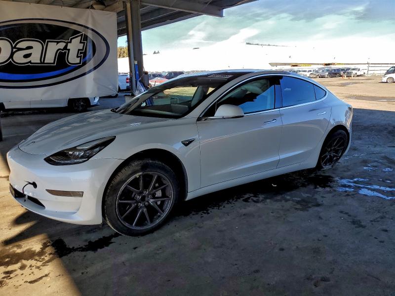 TESLA MODEL 3 2018 with VIN 5YJ3E1EA7JF020559 - Photo from auction