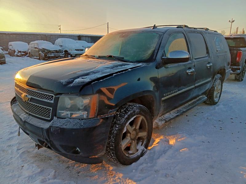 CHEVROLET SUBURBAN 2011 with VIN 1GNSKKE36BR101034 - Photo from auction