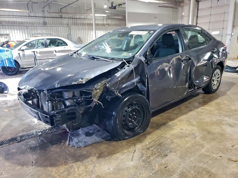 TOYOTA COROLLA 2018 with VIN 5YFBURHE5JP820597 - Photo from auction
