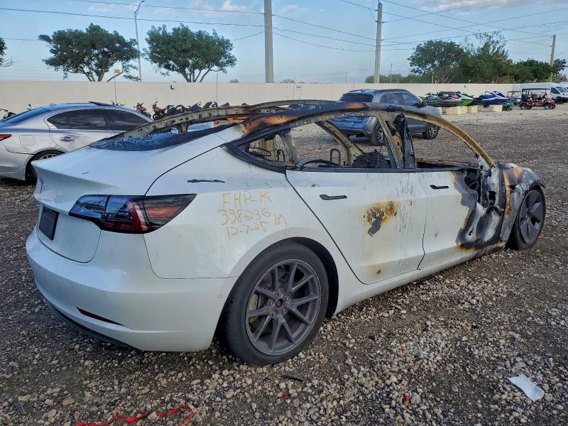 Photo 3 from auction – 2021 TESLA MODEL 3 with VIN 5YJ3E1EA9MF908010