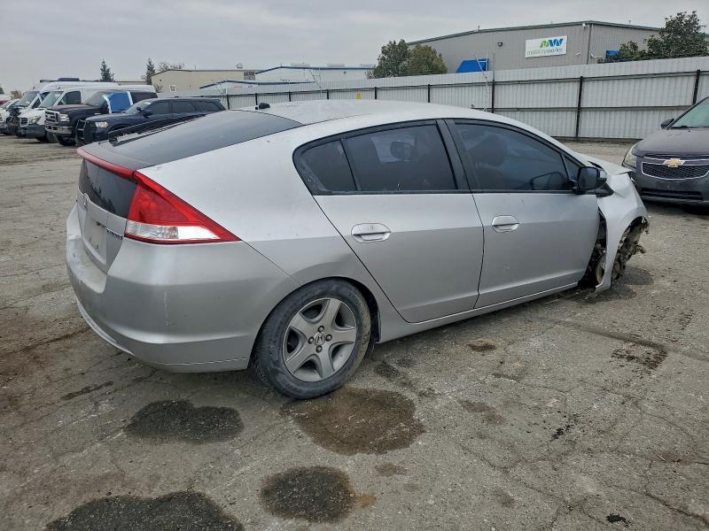 Photo 3 from auction – 2010 HONDA INSIGHT LX with VIN JHMZE2H53AS009977