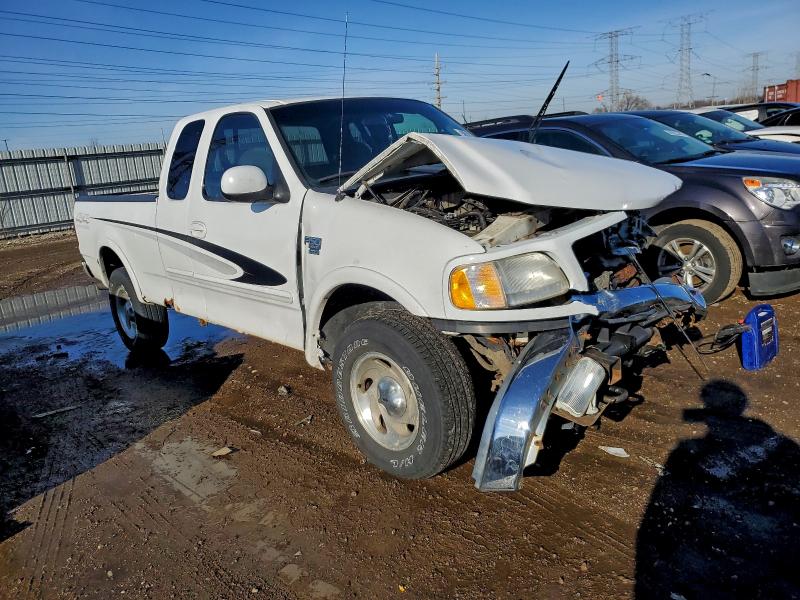 Photo 4 from auction – 2000 FORD F150 with VIN 1FTRX18L1YNA17539