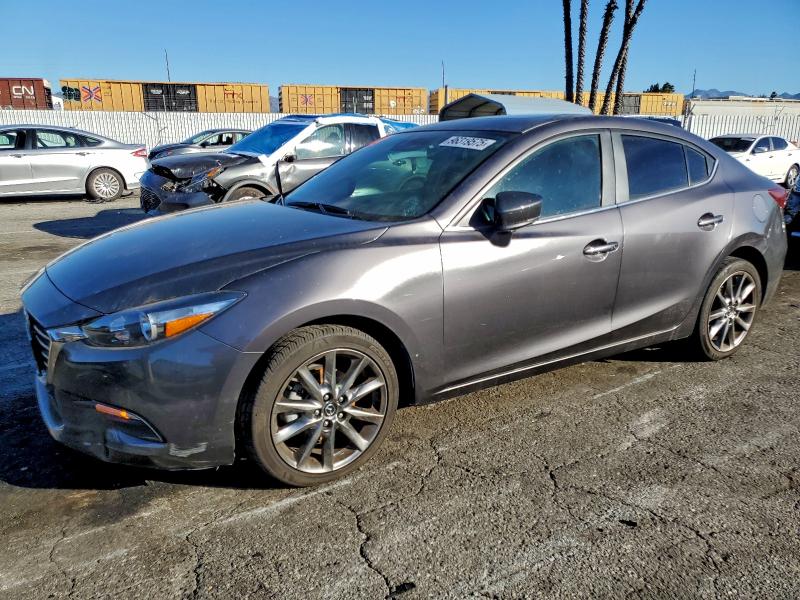 MAZDA 3 TOURING 2018 with VIN 3MZBN1V3XJM256774 - Photo from auction