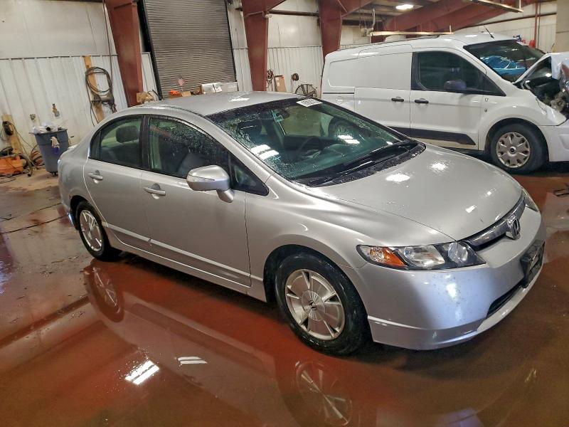 Photo 4 from auction – 2006 HONDA CIVIC HYBR with VIN JHMFA36256S003182