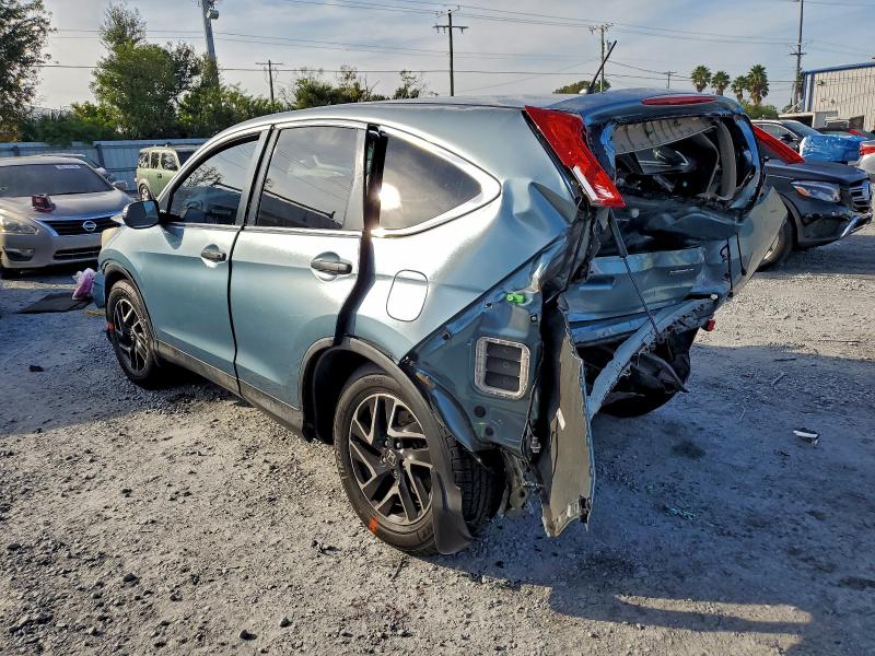 Photo 2 from auction – 2016 HONDA CR-V with VIN 2HKRM3H43GH526026