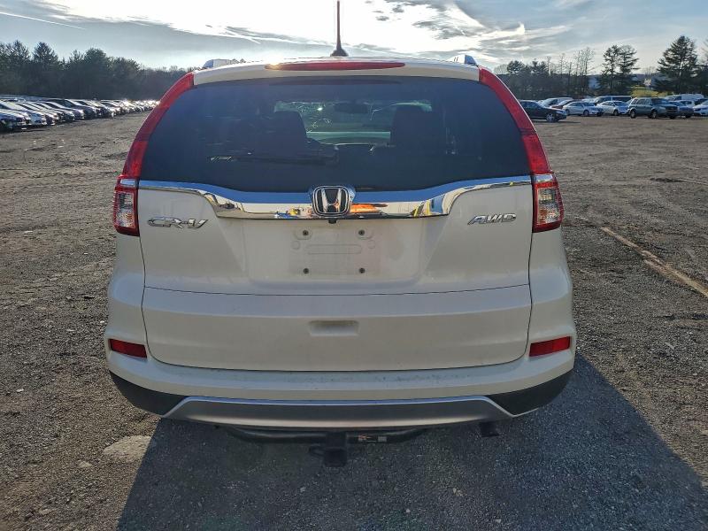 Photo 6 from auction – 2016 HONDA CR-V EXL with VIN 5J6RM4H70GL033376