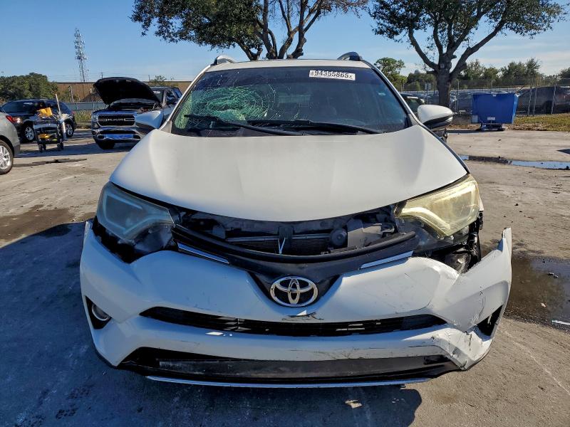 Photo 5 from auction – 2016 TOYOTA RAV4 with VIN 2T3WFREV7GW240542