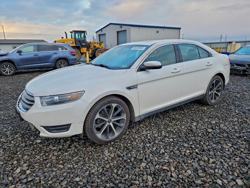 FORD TAURUS SEL 2015 with VIN 1FAHP2H85FG166153 - Photo from auction