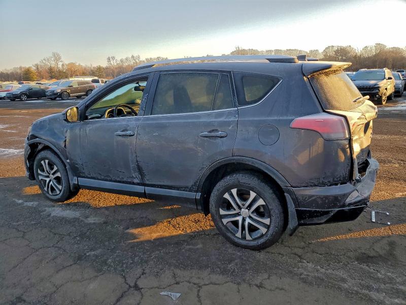 Photo 2 from auction – 2016 TOYOTA RAV4 LE with VIN JTMBFREV1GJ091395