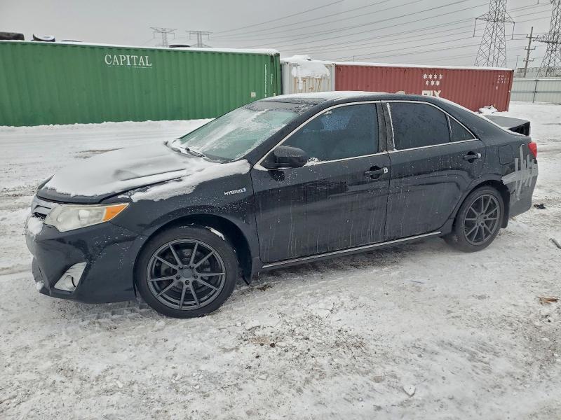 Photo 1 from auction – 2014 TOYOTA CAMRY HYBR with VIN 4T1BD1FK7EU099648