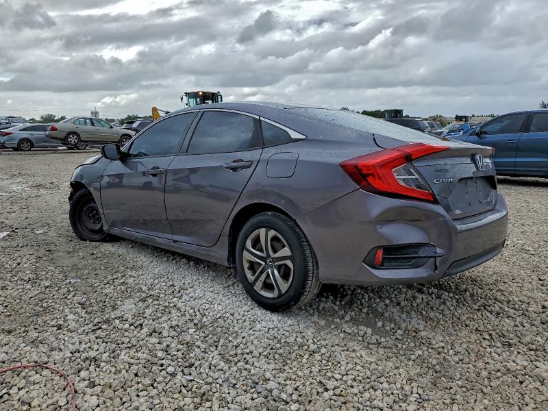 Photo 2 from auction – 2018 HONDA CIVIC LX with VIN 19XFC2F54JE000656