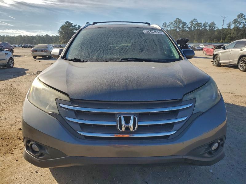 Photo 5 from auction – 2014 HONDA CR-V EXL with VIN 2HKRM3H7XEH504144