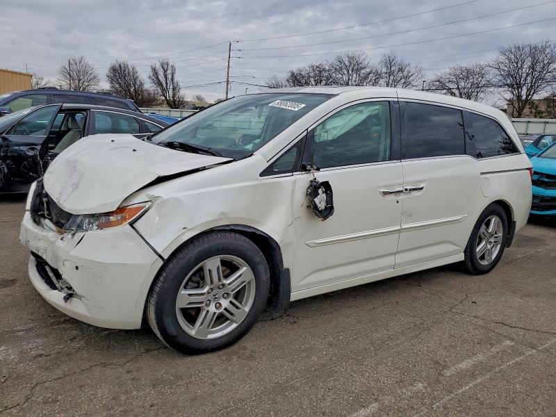 HONDA ODYSSEY TO 2013 with VIN 5FNRL5H97DB084582 - Photo from auction