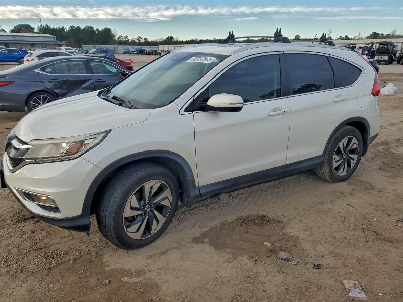 HONDA CR-V TOURI 2015 with VIN 5J6RM3H90FL020038 - Photo from auction