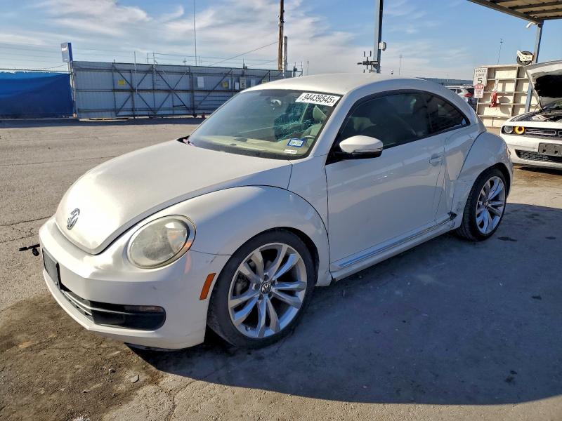 VOLKSWAGEN BEETLE 2013 with VIN 3VWJX7AT2DM669016 - Photo from auction