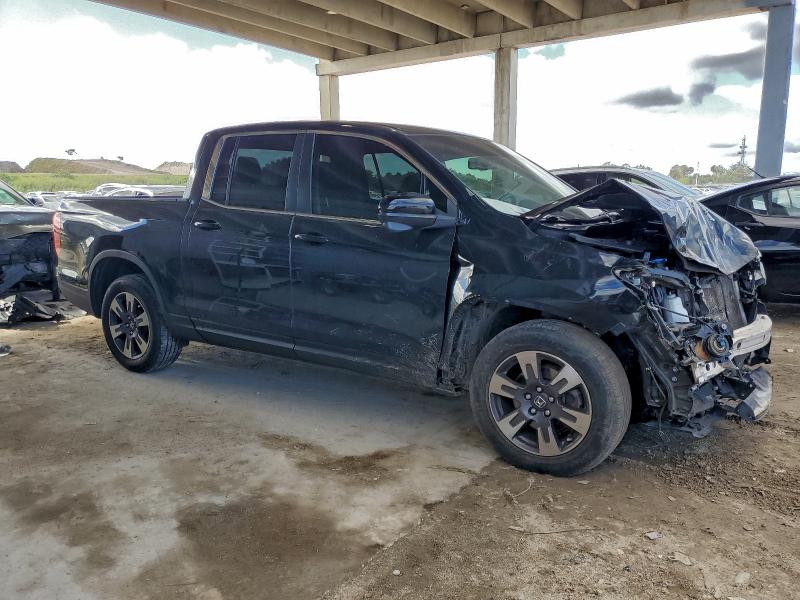 Фото 4 с аукциона – 2018 HONDA RIDGELINE с VIN 5FPYK2F60JB002300