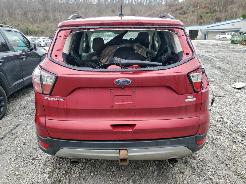 Photo 6 from auction – 2018 FORD ESCAPE SE with VIN 1FMCU9GD8JUC17980