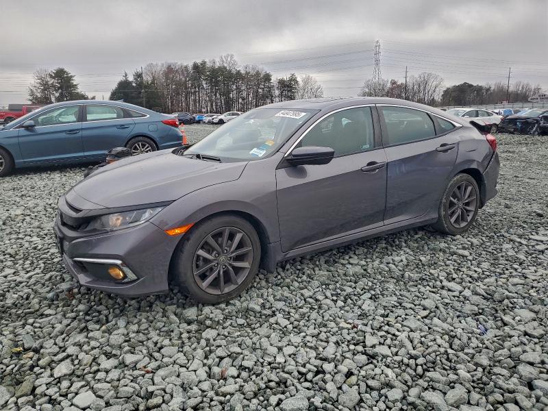 HONDA CIVIC 2021 with VIN 19XFC1F33ME202272 - Photo from auction