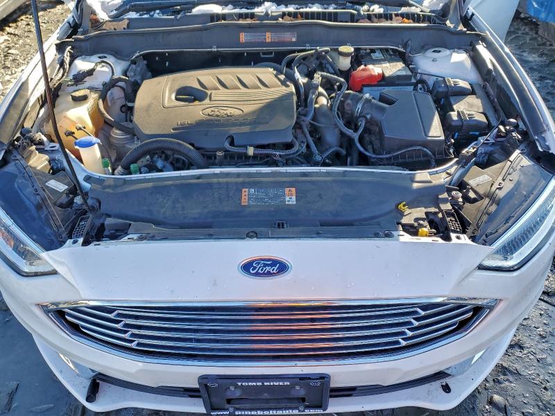 Photo 11 from auction – 2017 FORD FUSION with VIN 3FA6P0HD3HR142891