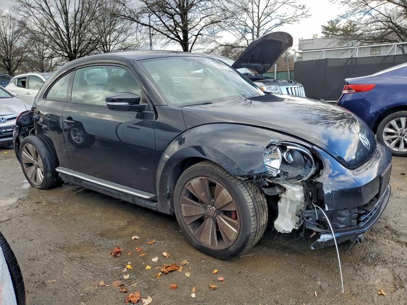 Photo 4 from auction – 2012 VOLKSWAGEN BEETLE TUR with VIN 3VW4A7AT2CM633792