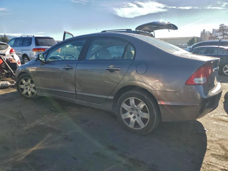 Photo 2 from auction – 2010 HONDA CIVIC LX with VIN 19XFA1F57AE018648