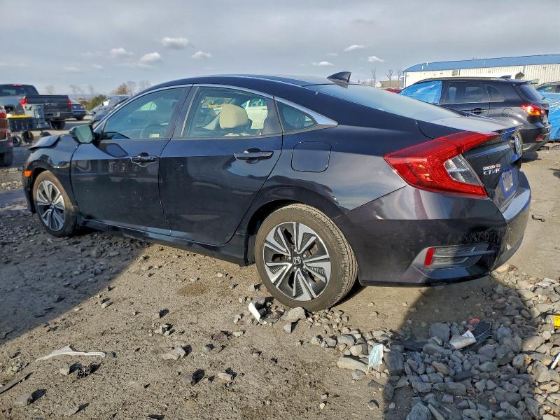 Photo 2 from auction – 2018 HONDA CIVIC EX with VIN JHMFC1F44JX011916