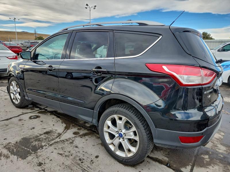 Photo 2 from auction – 2014 FORD ESCAPE TIT with VIN 1FMCU9J97EUA29753