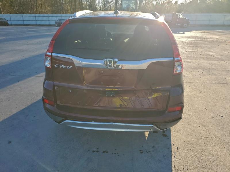 Photo 6 from auction – 2015 HONDA CR-V EXL with VIN 2HKRM3H74FH501984