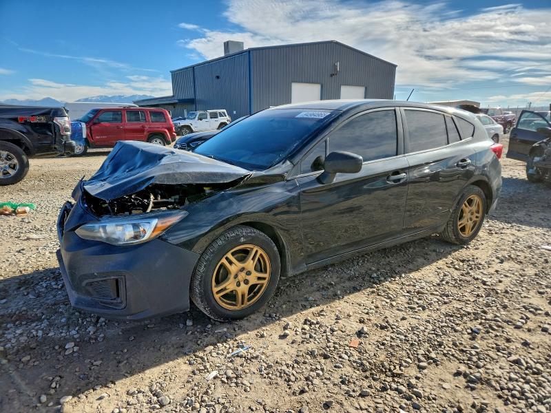 SUBARU IMPREZA 2018 with VIN 4S3GTAA64J3721680 - Photo from auction
