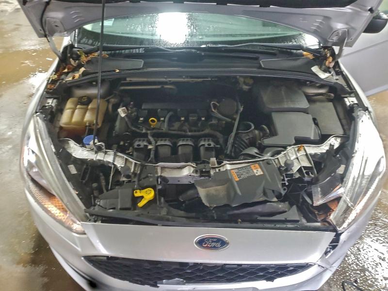 Photo 11 from auction – 2016 FORD FOCUS S with VIN 1FADP3E28GL201667