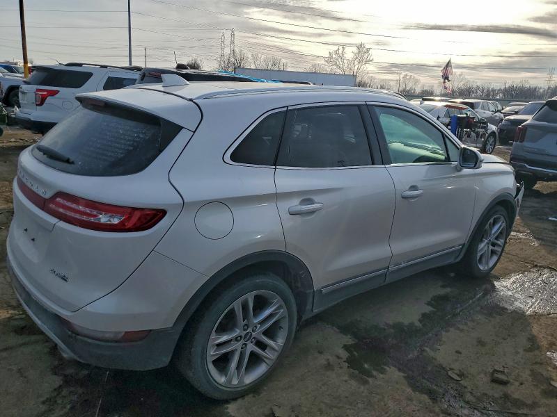 Photo 3 from auction – 2015 LINCOLN MKC with VIN 5LMCJ2A91FUJ01402