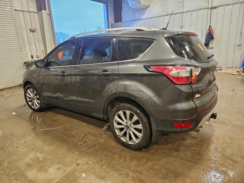 Photo 2 from auction – 2017 FORD ESCAPE TIT with VIN 1FMCU9J90HUD69301