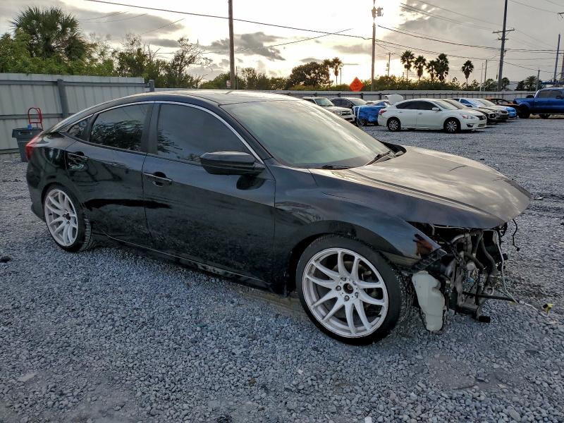 Photo 4 from auction – 2019 HONDA CIVIC LX with VIN 2HGFC2F62KH569361