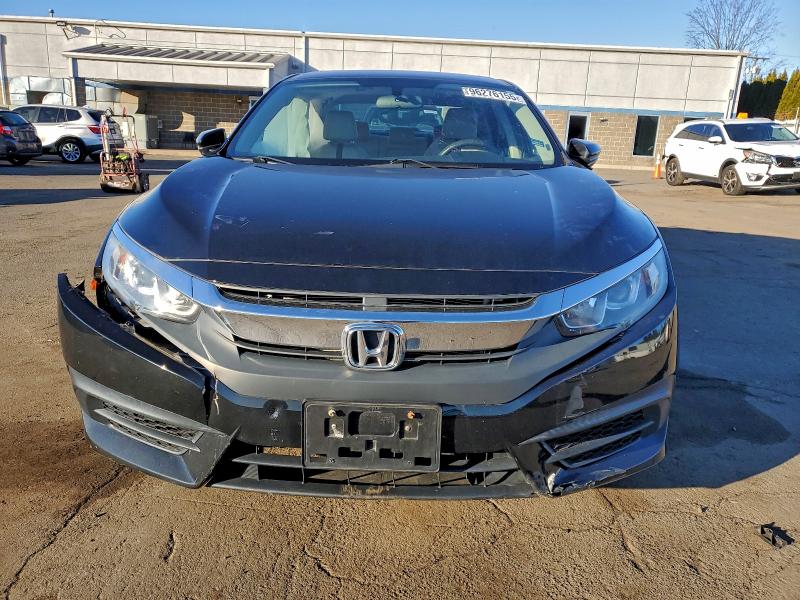 Photo 5 from auction – 2018 HONDA CIVIC EX with VIN 2HGFC2F73JH586094