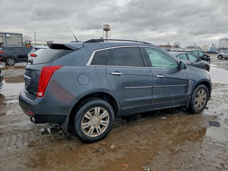 Photo 3 from auction – 2013 CADILLAC SRX with VIN 3GYFNAE32DS538342