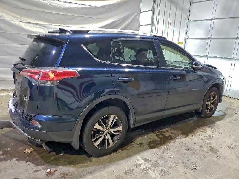 Photo 3 from auction – 2017 TOYOTA RAV4 XLE with VIN JTMRFREV3HJ700664