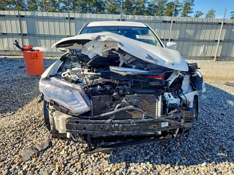 Photo 5 from auction – 2018 NISSAN ROGUE S with VIN KNMAT2MT2JP609014