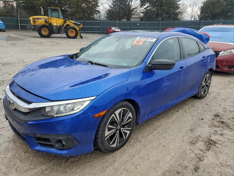 HONDA CIVIC EX 2016 with VIN 2HGFC1F36GH654677 - Photo from auction