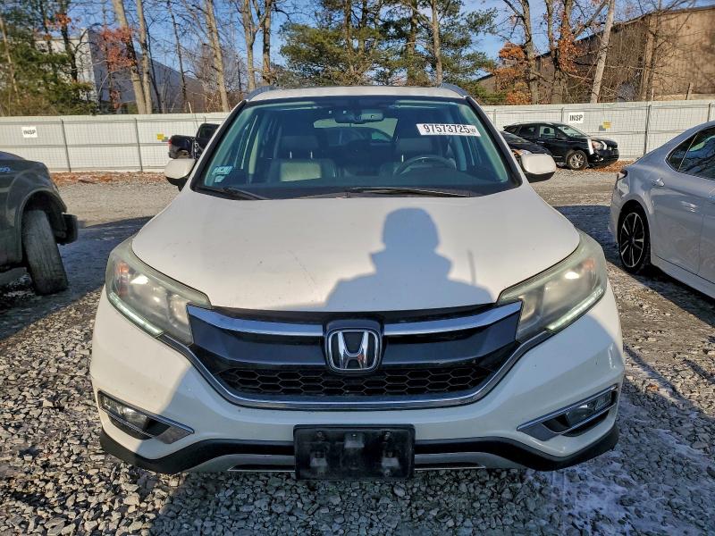 Photo 5 from auction – 2016 HONDA CR-V EXL with VIN 5J6RM4H73GL025630
