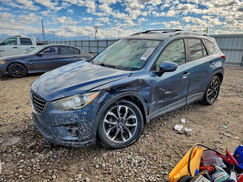 MAZDA CX-5 TOURI 2016 with VIN JM3KE4CY0G0695598 - Photo from auction