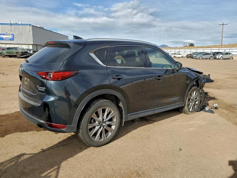 Photo 3 from auction – 2021 MAZDA CX-5 GRAND with VIN JM3KFBDM5M0410127