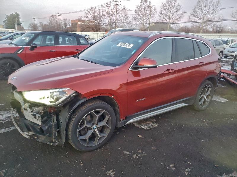 BMW X1 XDRIVE2 2018 with VIN WBXHT3C34J5F92031 - Photo from auction