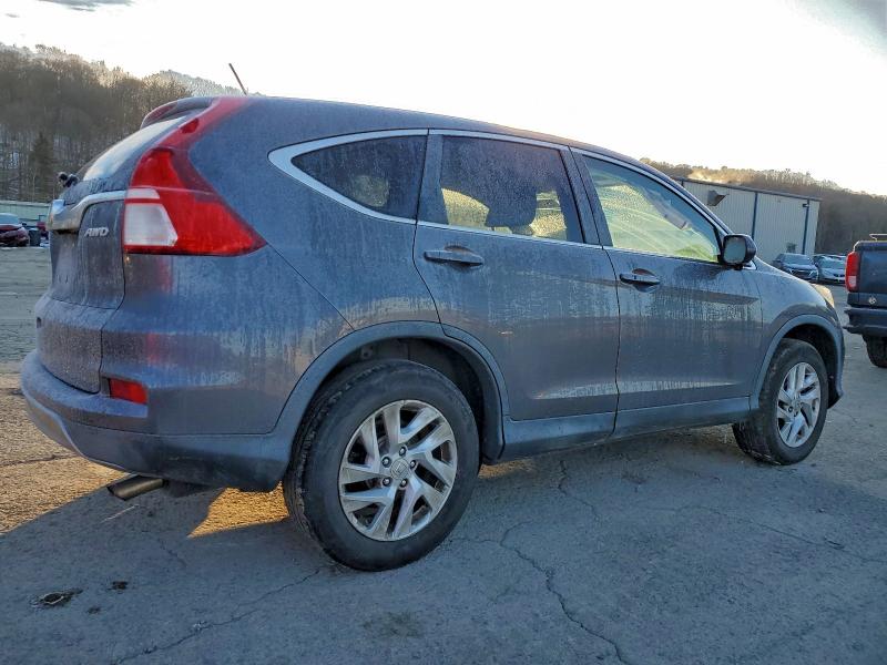 Photo 3 from auction – 2015 HONDA CR-V with VIN 2HKRM4H56FH649087