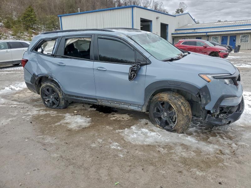 Photo 4 from auction – 2022 HONDA PILOT TRAI with VIN 5FNYF6H88NB083152