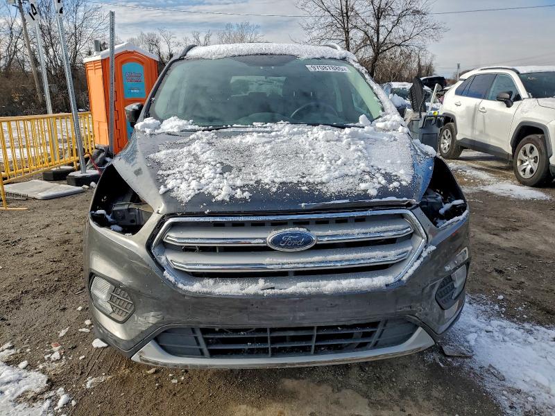 Photo 5 from auction – 2018 FORD ESCAPE with VIN 1FMCU9GD4JUC27860