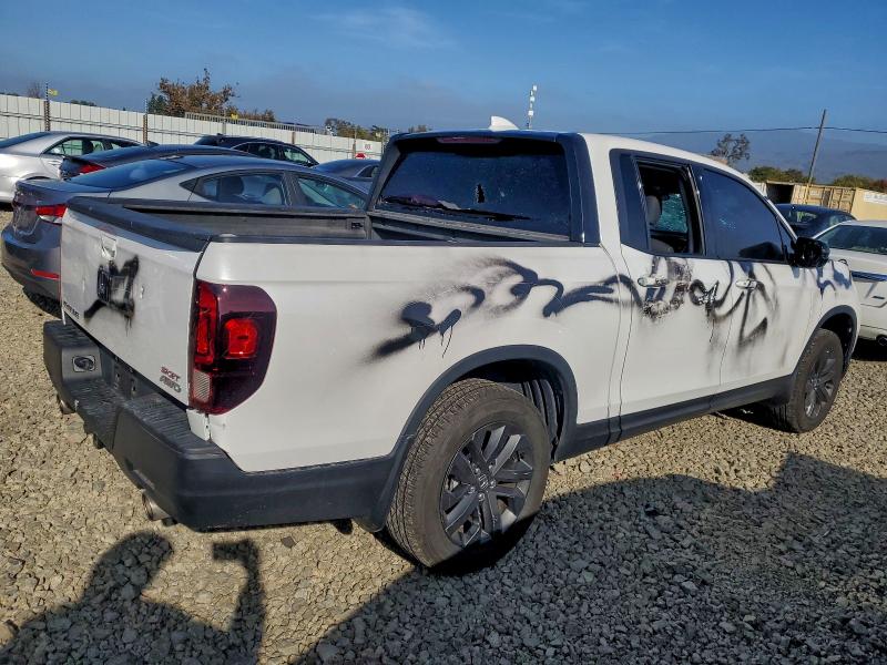 Photo 3 from auction – 2023 HONDA RIDGELINE with VIN 5FPYK3F10PB057347