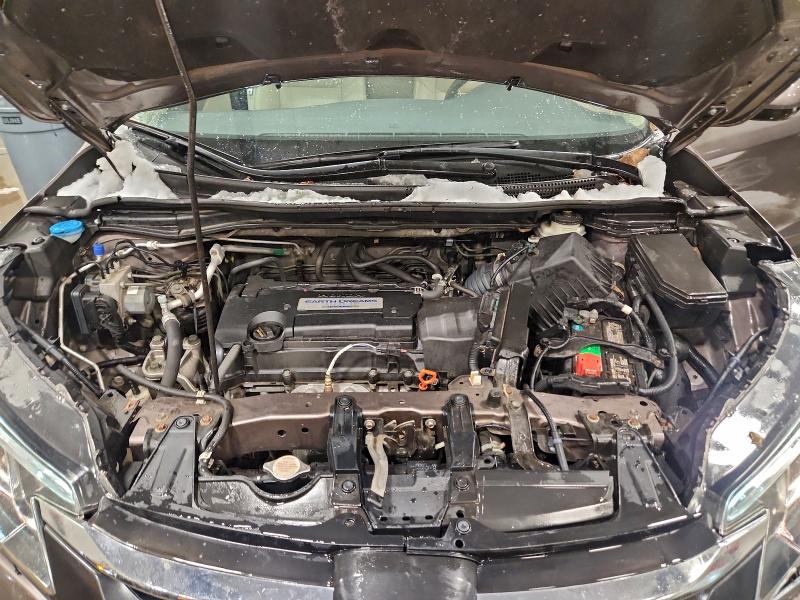 Photo 11 from auction – 2015 HONDA CR-V EXL with VIN 2HKRM4H70FH601036