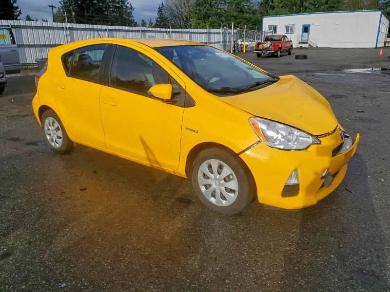 Photo 4 from auction – 2014 TOYOTA PRIUS C with VIN JTDKDTB39E1062309
